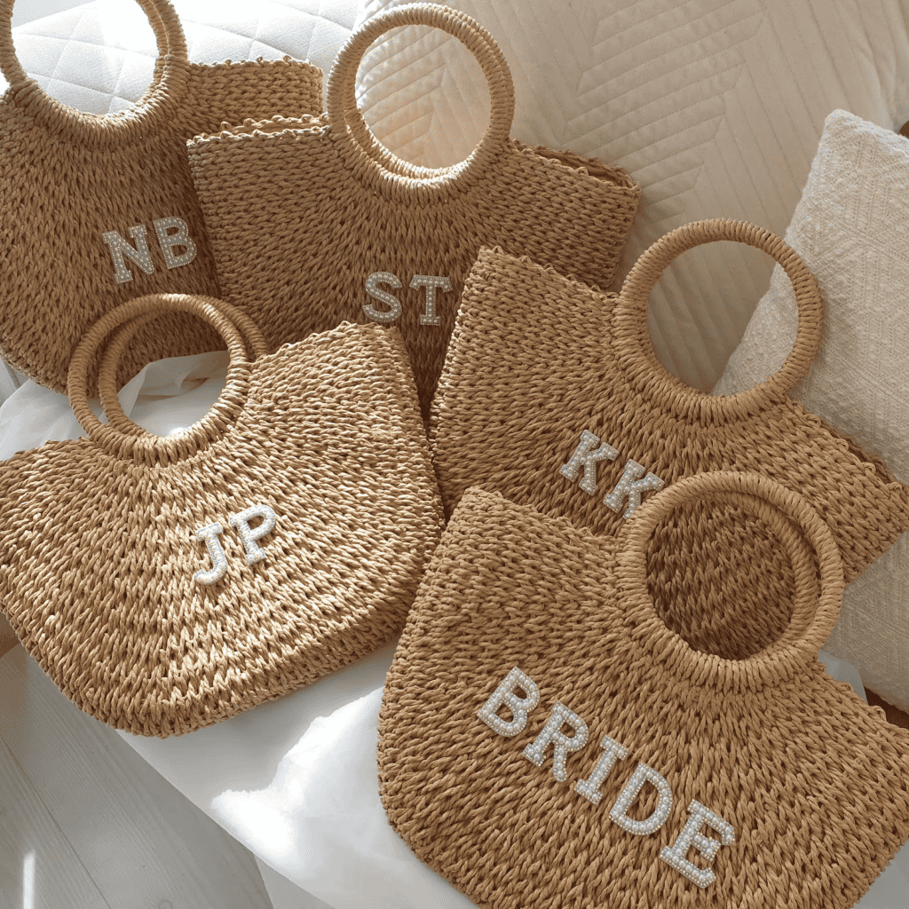 A group of six bags with the letters bride and initials.