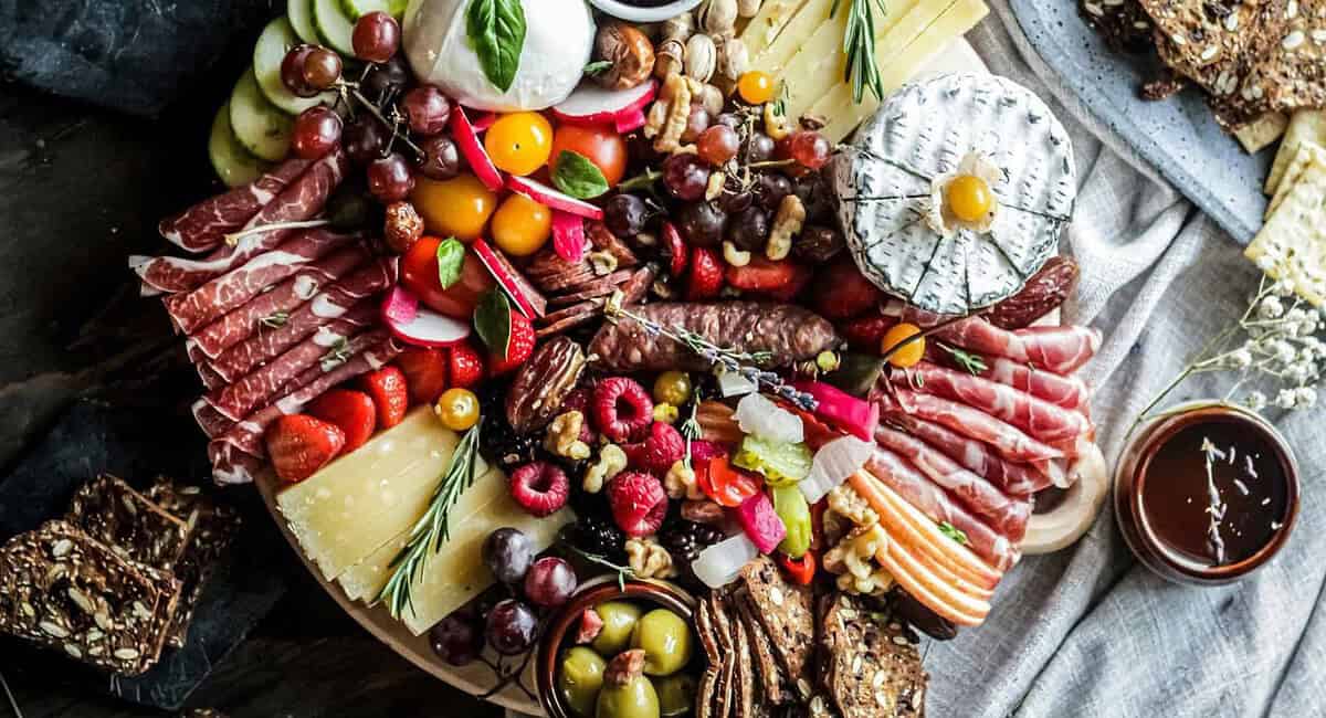A large platter of food on top of a table.