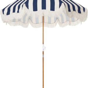A blue and white umbrella with a wooden pole.