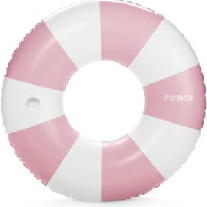 A pink and white inflatable ring on top of the ground.