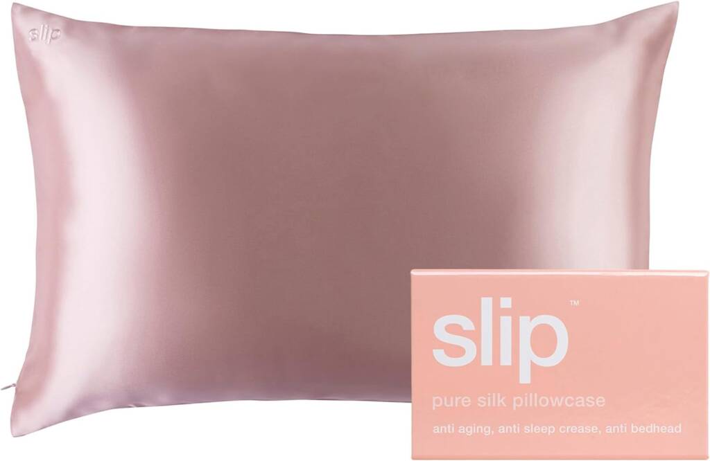 A pink pillow with slip logo on it.