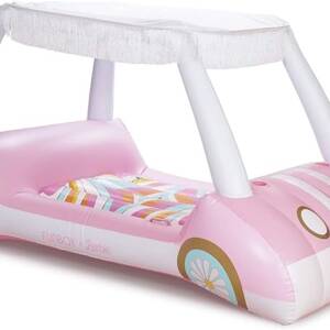 A pink car shaped pool float with a canopy.