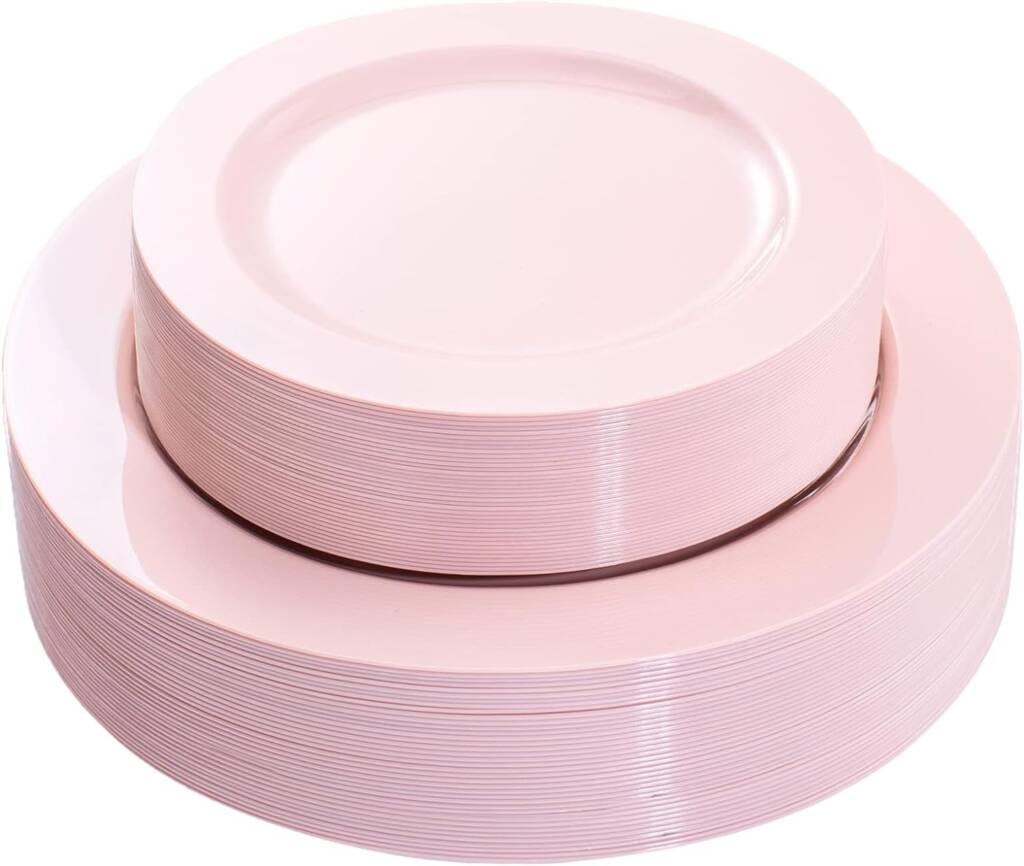 A stack of pink plates on top of each other.
