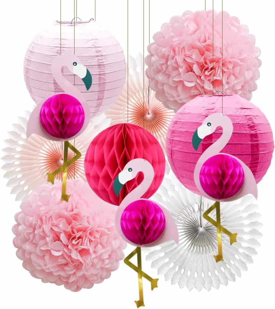 A bunch of pink and white paper decorations