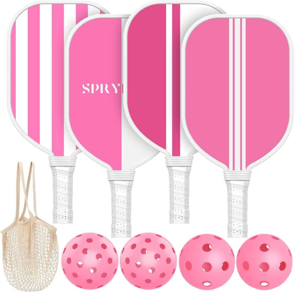 A set of pink rackets and balls with a white stripe on the side.