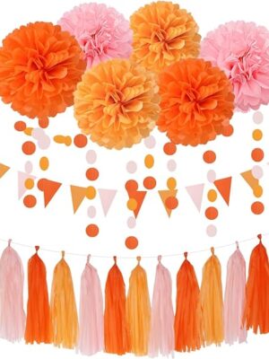 A bunch of orange and pink decorations hanging from the ceiling