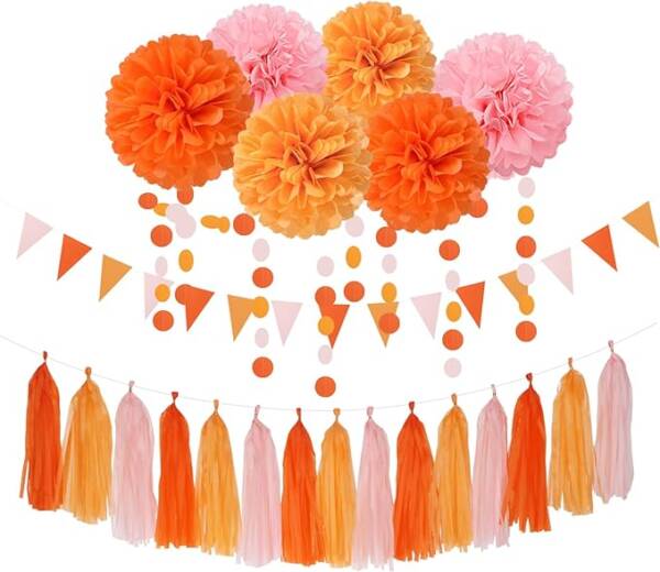 A bunch of orange and pink decorations hanging from the ceiling