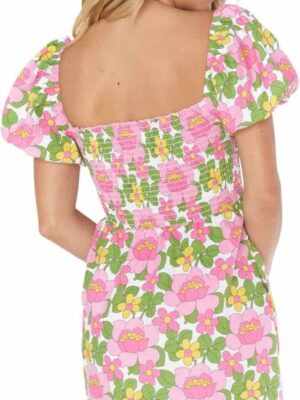 71uLTGtsyXL._AC_SX679_.jpg A woman wearing a pink and green floral dress.
