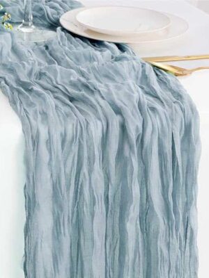 A table with plates and a white plate on it