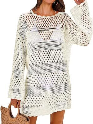 A woman in white dress holding a purse.