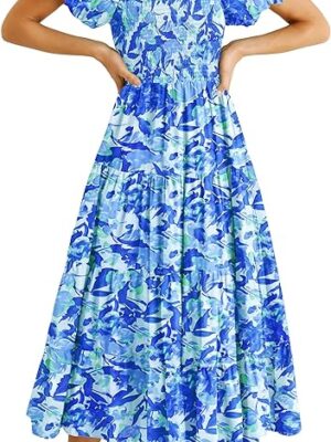 A woman in blue and white floral print dress.