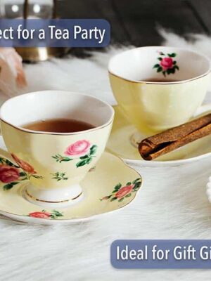 A couple of cups and saucers on top of a table.