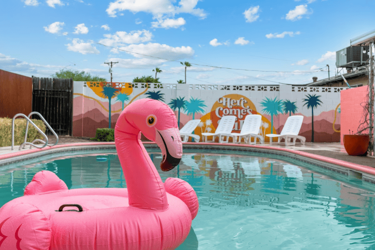 20 Best Bachelorette Houses In Scottsdale That Guarantee Unforgettable Celebrations 41 A Pink Flamingo Float In The Middle Of An Outdoor Pool.