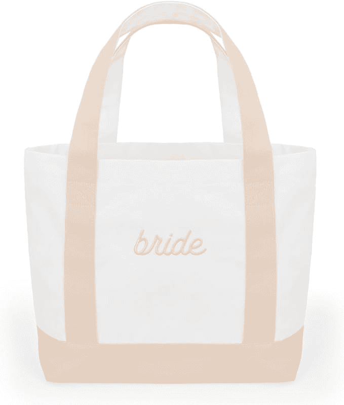 A white and tan tote bag with the word bride written on it.