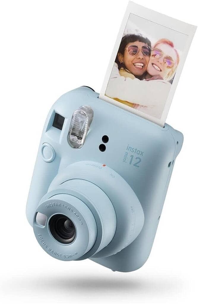 A blue camera with a picture of a baby on it.