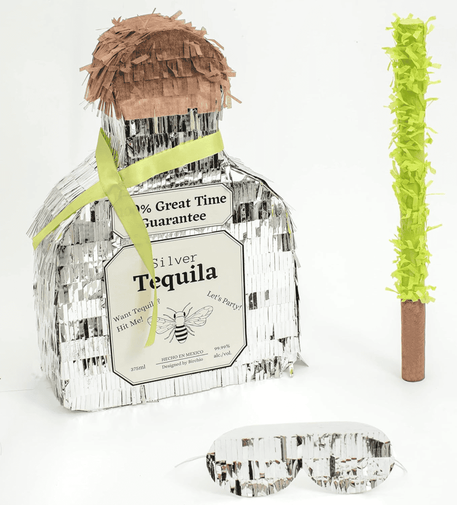 A bottle of tequila with a straw sticking out of it.