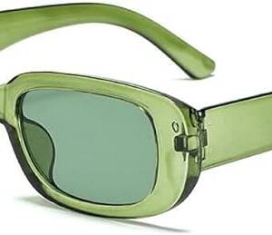 A pair of green sunglasses with a clear frame.