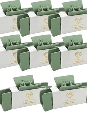 A set of eight green and white boxes with gold labels.