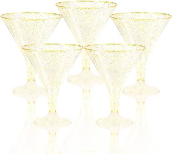 A group of six champagne glasses sitting on top of each other.