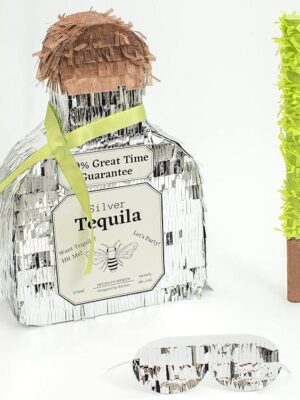 A bottle of tequila with a straw in it.