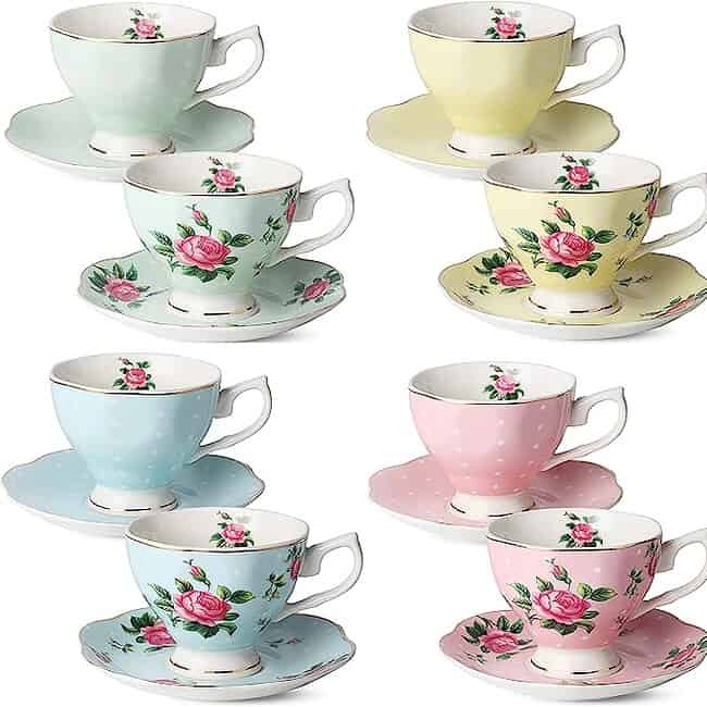 A set of six cups and saucers in different colors.