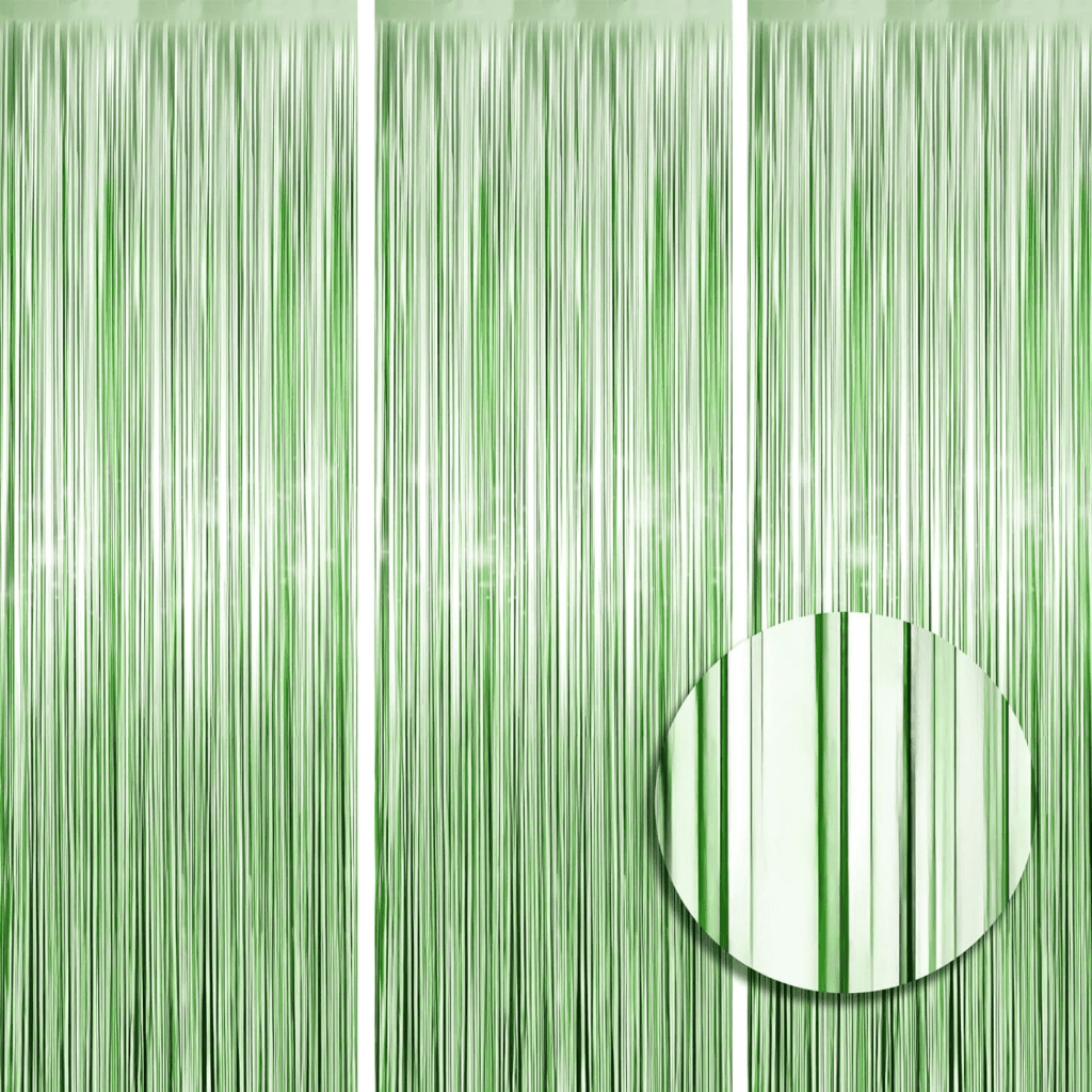A green curtain with a white circle in the middle.