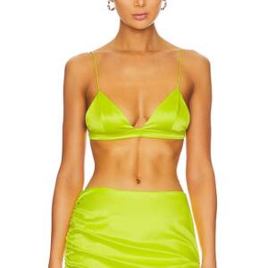 A woman in a lime green bikini top and skirt.