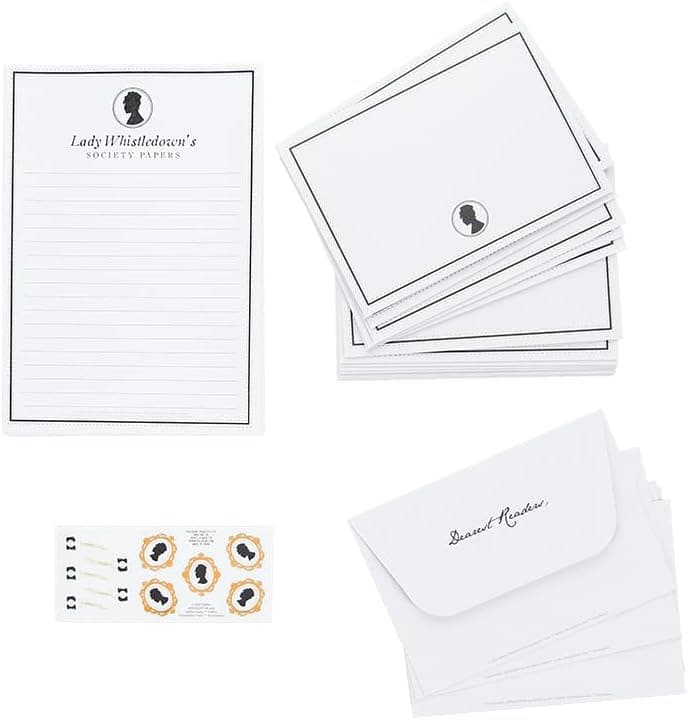 A set of cards and envelopes with a picture on them.