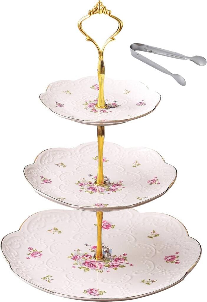 A three tier cake stand with spoons and forks