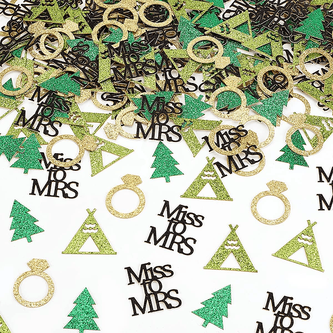 A pile of confetti that say " mrs." and " miss ".