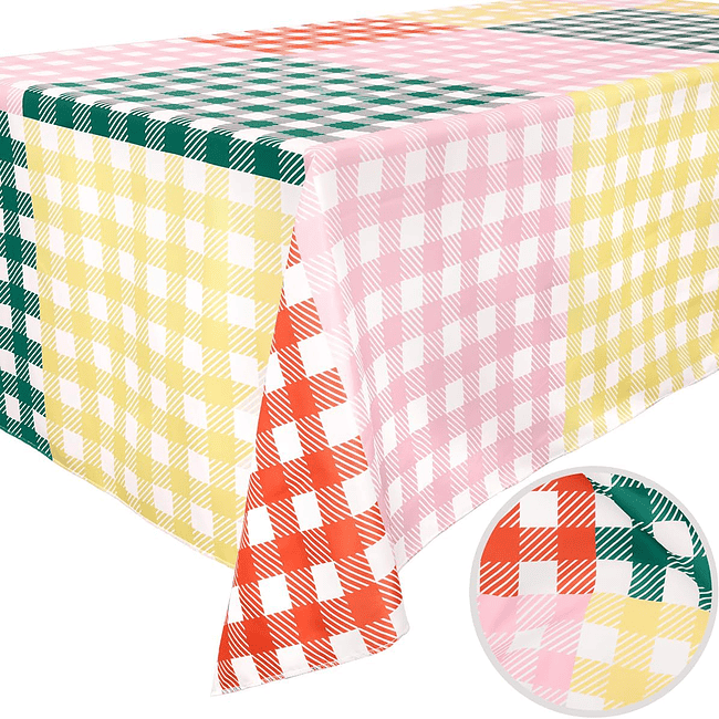 A table cloth with different colored gingham patterns.