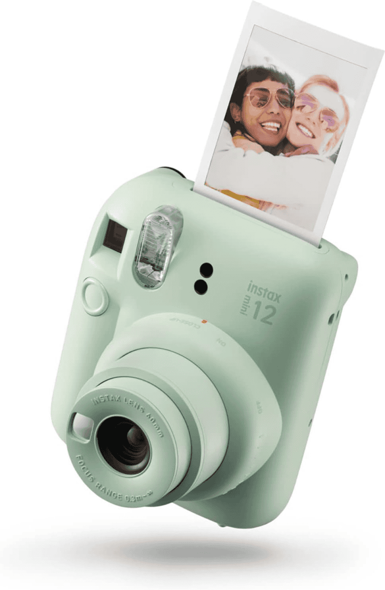 A close up of an instant camera with a picture on the back