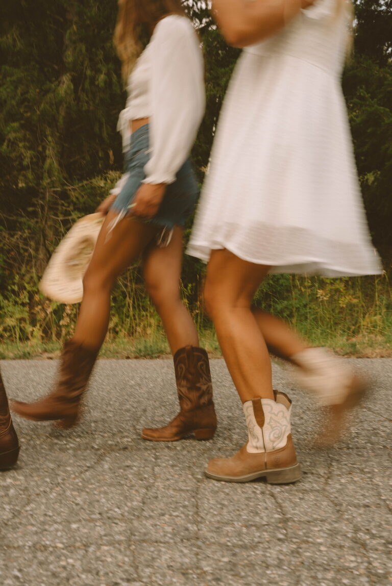 Coastal Cowgirl Bachelorette 20 A Blurry Image Of Two Women Walking
